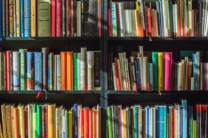 stack of books in public school library